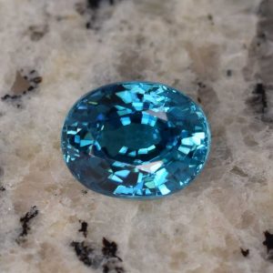 BlueZircon_oval_10.1x8.0mm_4.96cts_H_zn1648_b_SOLD