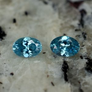 BlueZircon_oval_pair_6.4x4.5mm_1.66cts_zn2614