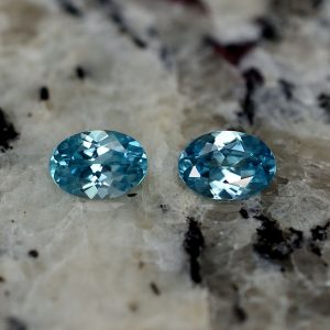 BlueZircon_oval_pair_7.0x5.0mm_2.16cts_zn2613