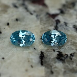 BlueZircon_oval_pair_7.5x5.0mm_2.61cts_zn2612