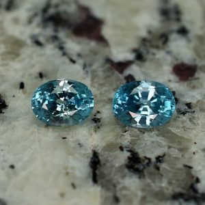 BlueZircon_oval_pair_8.9x6.8mm_5.66cts_zn1017