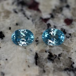 BlueZircon_oval_pair_9.0x6.8mm_5.58cts_zn1928