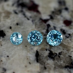 BlueZircon_round_suite_6.4_6.0_5.0mm_4.22cts_zn1530_SOLD