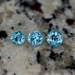 BlueZircon_round_suite_6.5_6.0_5.5mm_4.93cts_zn1483_SOLD