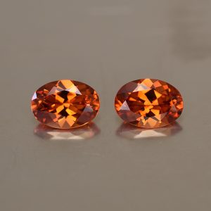 Spessartite_oval_pair_7.1x5.1mm_2.00cts_sg120