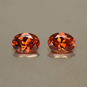 Spessartite_oval_pair_7.6x5.6mm_2.56cts_sg116