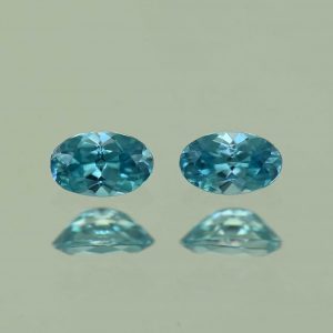 BlueZircon_oval_pair_4.9x3.0mm_0.65cts_H_zn4764_SOLD