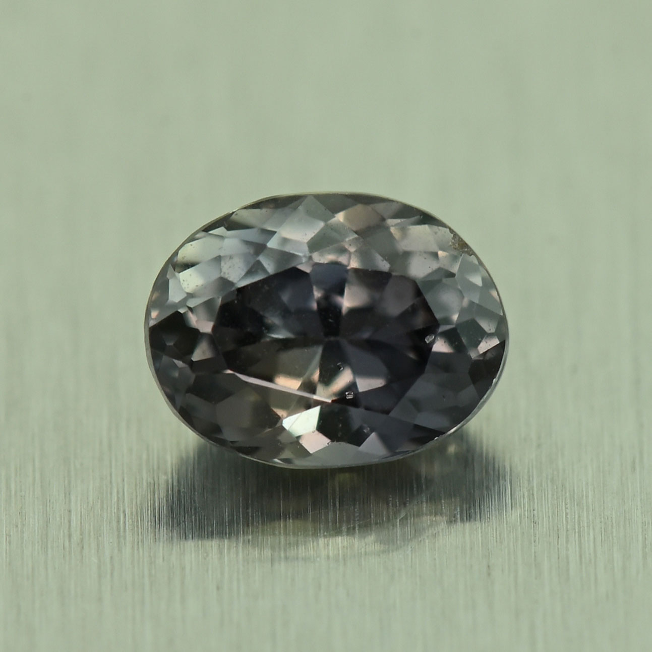 ColorChangeSapphire_oval_5.5x4.2mm_0.63cts_N_sa734_day