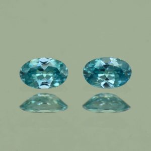 BlueZircon_oval_pair_5.5x3.5mm_0.85cts_H_zn4766
