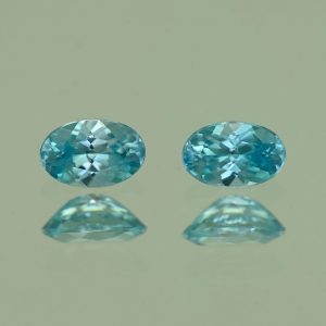 BlueZircon_oval_pair_5.5x3.5mm_0.98cts_H_zn4769
