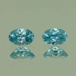 BlueZircon_oval_pair_6.0x4.0mm_1.35cts_H_zn4770