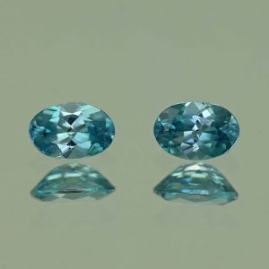 BlueZircon_oval_pair_6.0x4.0mm_1.35cts_H_zn4772