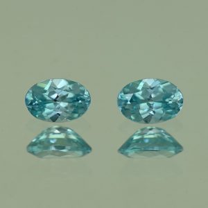 BlueZircon_oval_pair_6.0x4.0mm_1.36cts_H_zn2194