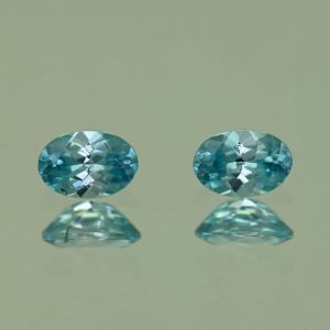 BlueZircon_oval_pair_6.0x4.0mm_1.43cts_H_zn2195