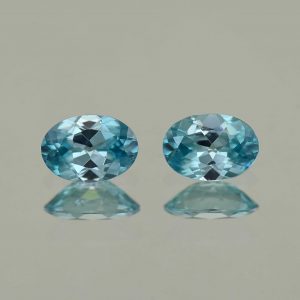 BlueZircon_oval_pair_7.0x5.0mm_1.94cts_H_zn2196