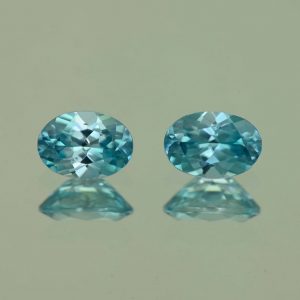 BlueZircon_oval_pair_7.0x5.0mm_2.29cts_H_zn4781