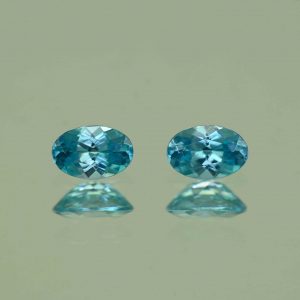 BlueZircon_oval_pair_6.0x4.0mm_1.30cts_H_zn7540