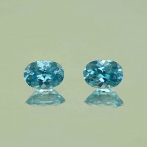 BlueZircon_oval_pair_7.0x5.0mm_2.27cts_H_zn7547