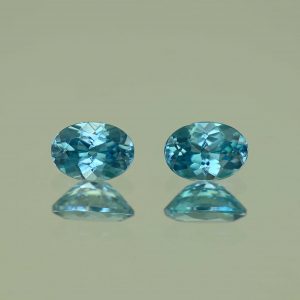 BlueZircon_oval_pair_7.0x5.0mm_2.43cts_H_zn7548