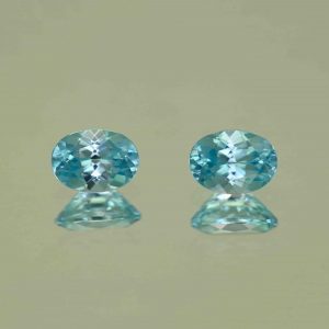 BlueZircon_oval_pair_7.5x5.5mm_3.10cts_H_zn7549